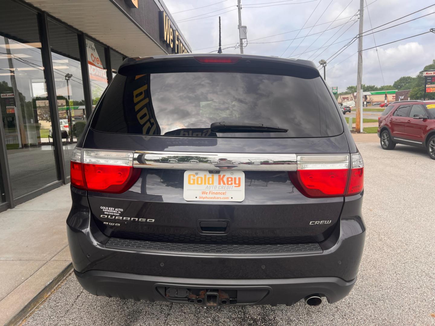 2013 Brilliant Black Crystal Pearl Dodge Durango Crew AWD (1C4RDJDG8DC) with an 3.6L V6 DOHC 24V engine, 5-Speed Automatic transmission, located at 1633 W Kimberly, Davenport, IA, 52806, (563) 323-5341, 41.559456, -90.598732 - Photo#4